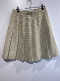 Pleated plaid mini skirt