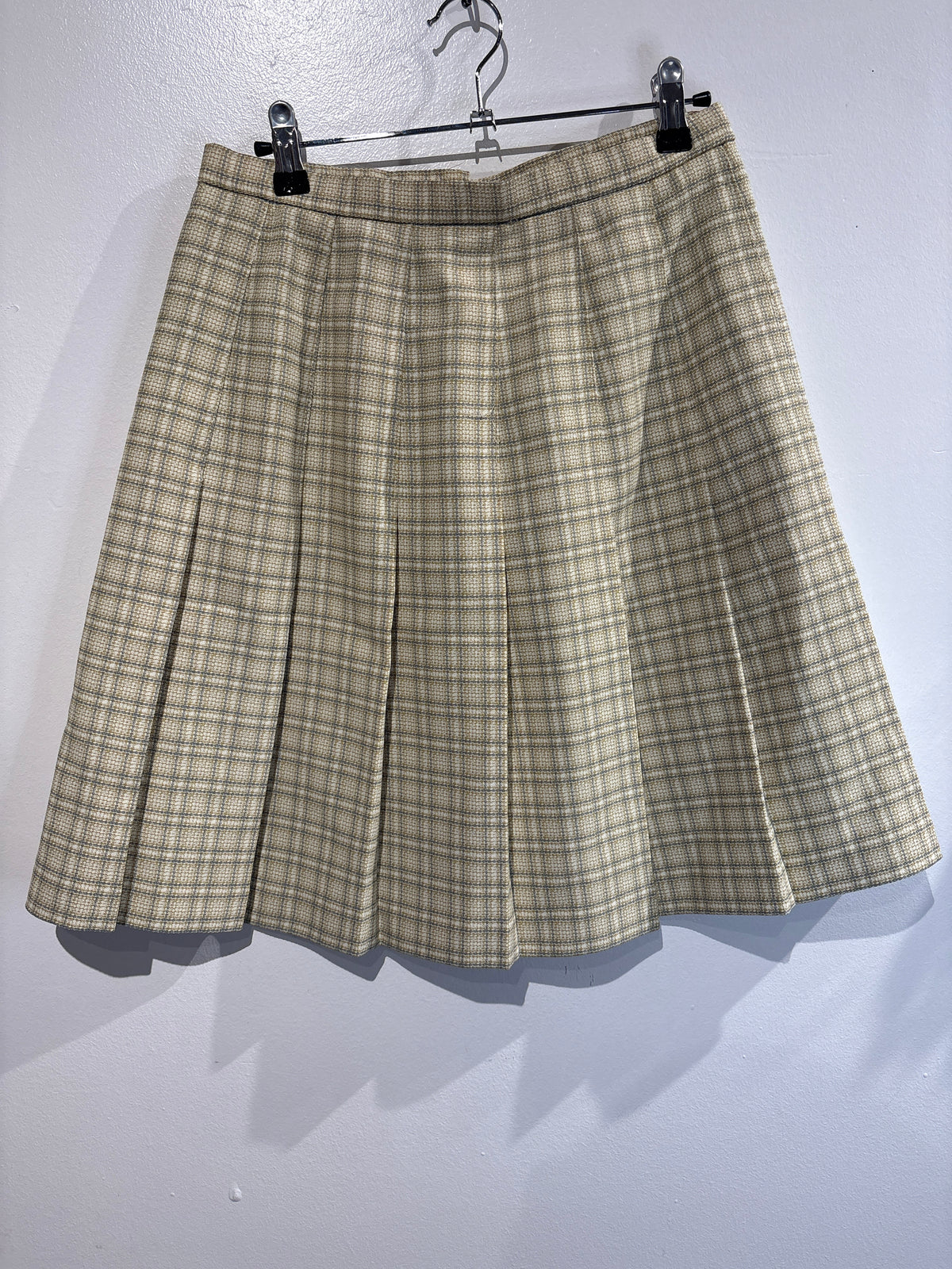 Pleated plaid mini skirt